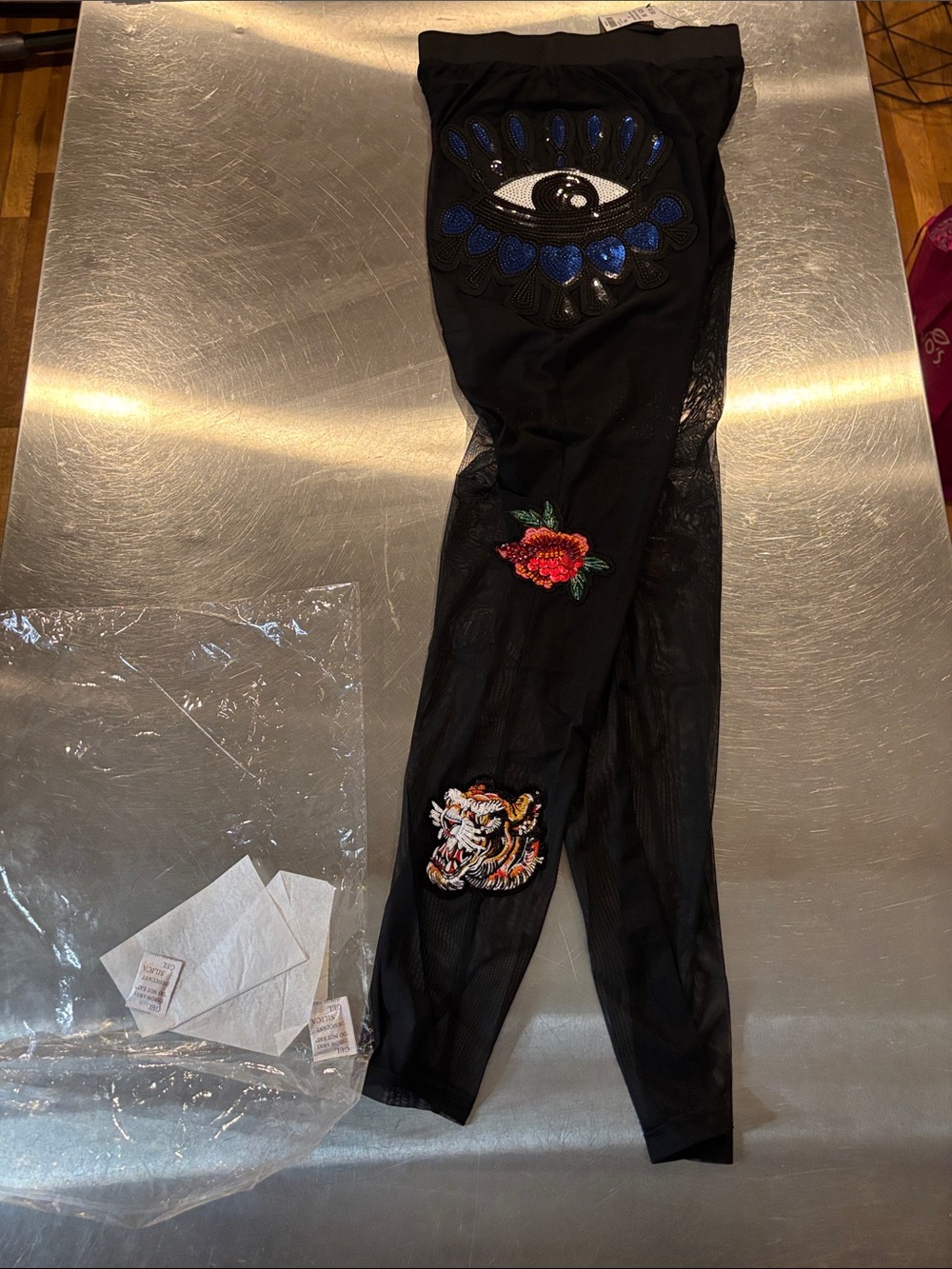 AKIRA Black Sheer Leggings with Blue Embroidered Cutouts